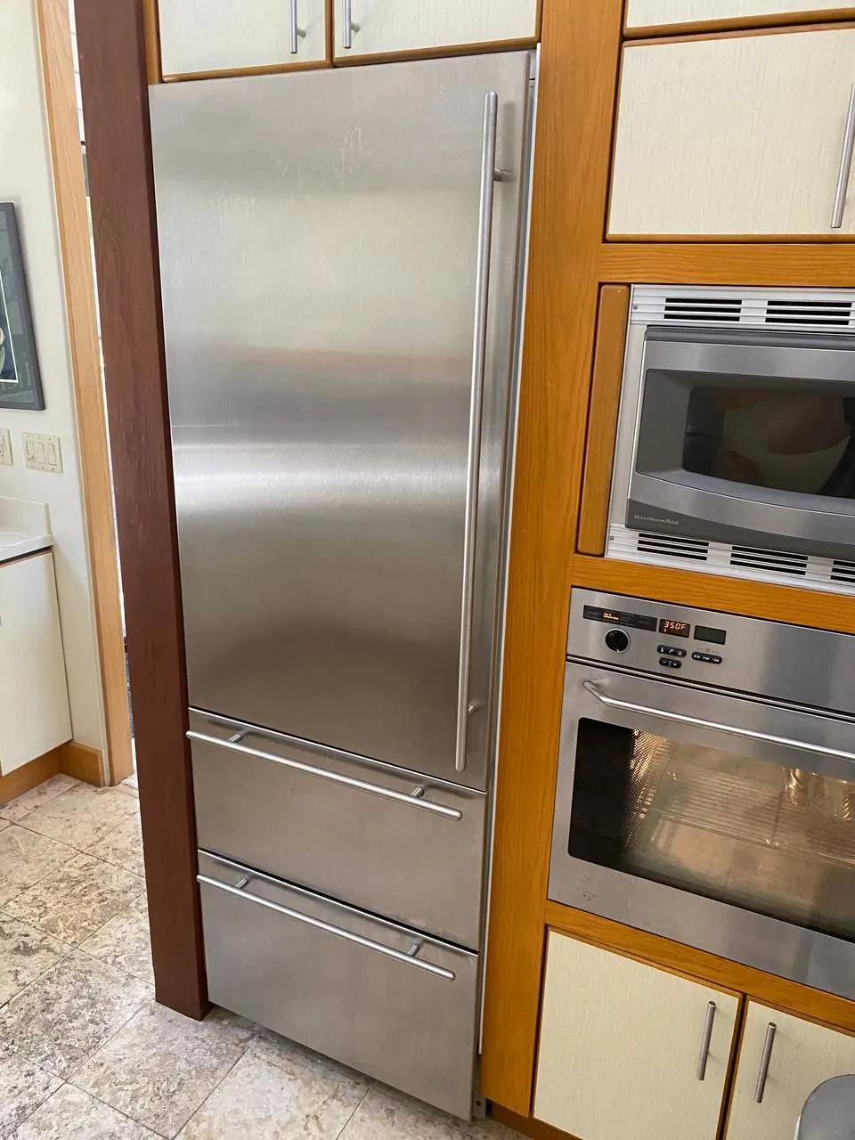 Sub-Zero built-in refrigerator and double wall oven in a San Diego kitchen