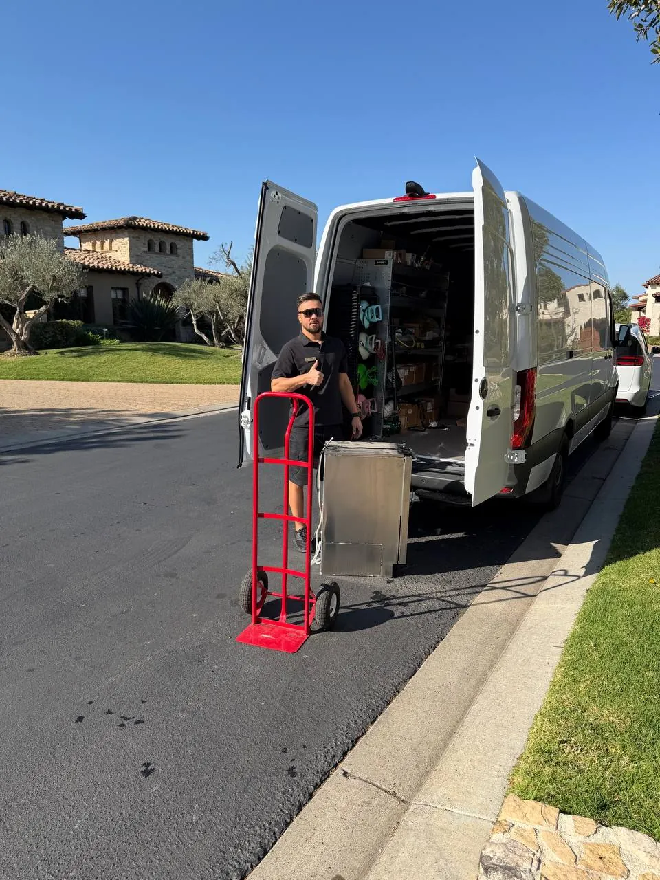 Big Joe technician at the service van delivering a rebuilt Sub-Zero ice maker